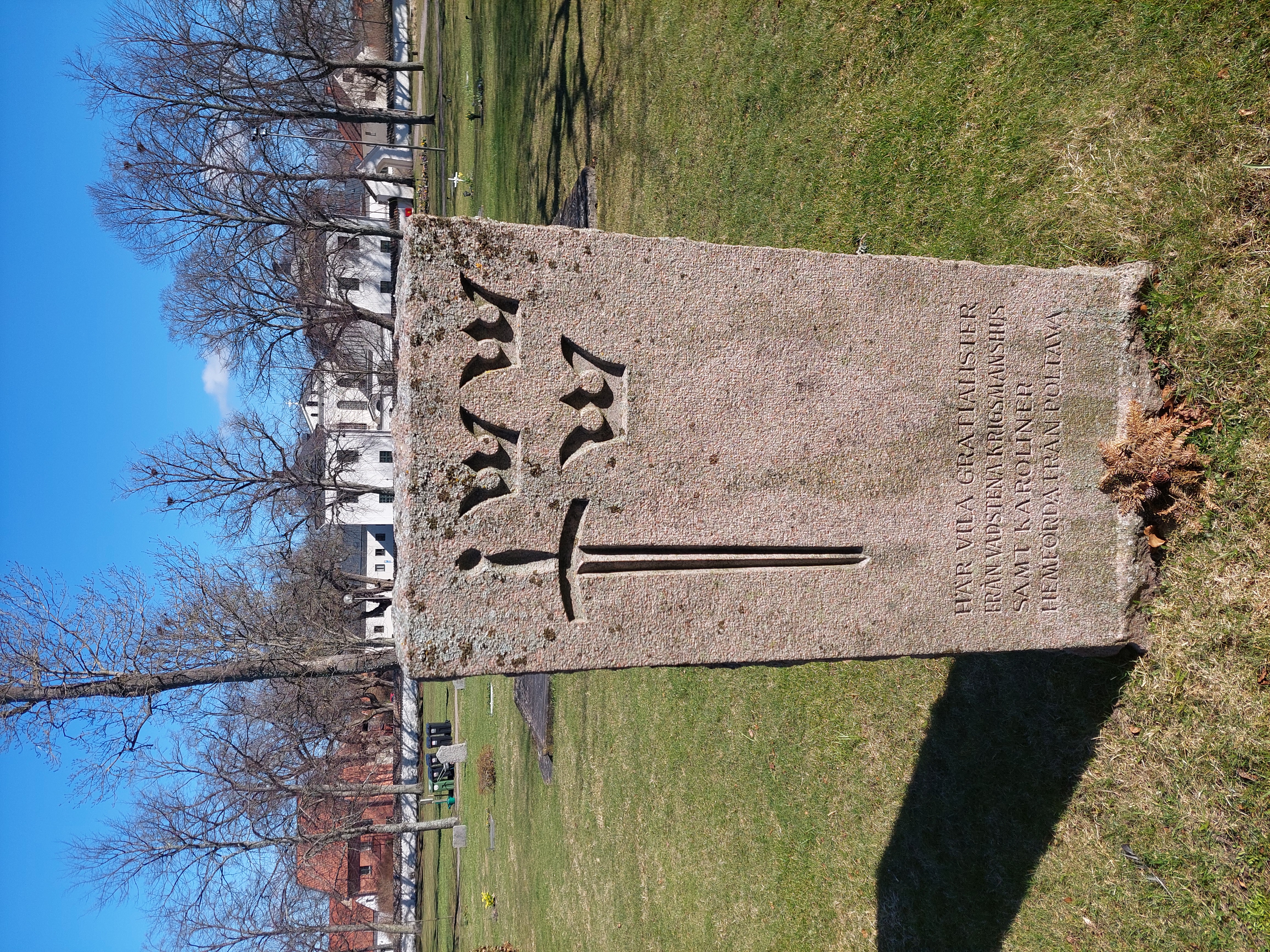 Minnessten Vadstena kyrkogård.